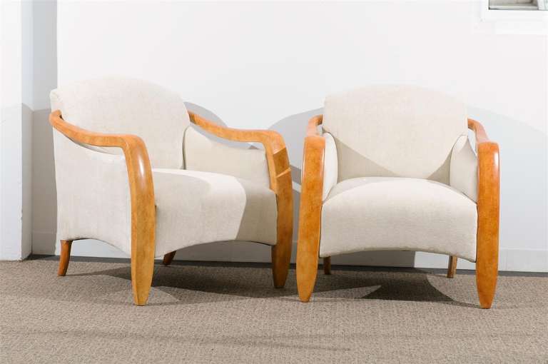 These magnificent lounge chairs are shipped as professionally photographed and described in the listing narrative: Meticulously professionally restored and installation ready. Expert custom upholstery service is available.

An absolutely fantastic