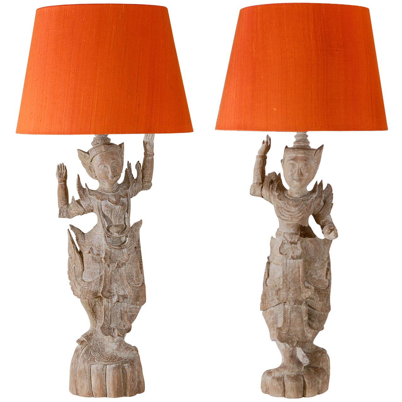 A Spectacular Pair of Monumental Male and Female Asian Lamps