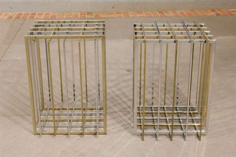 A beautiful pair of cage style table bases by Pierre Cardin, circa 1970s. Comprised of alternating flat bar squares in nickel and brass. The grid will form a square or diamond shape. Functional pieces that will serve as a dining table, console or as
