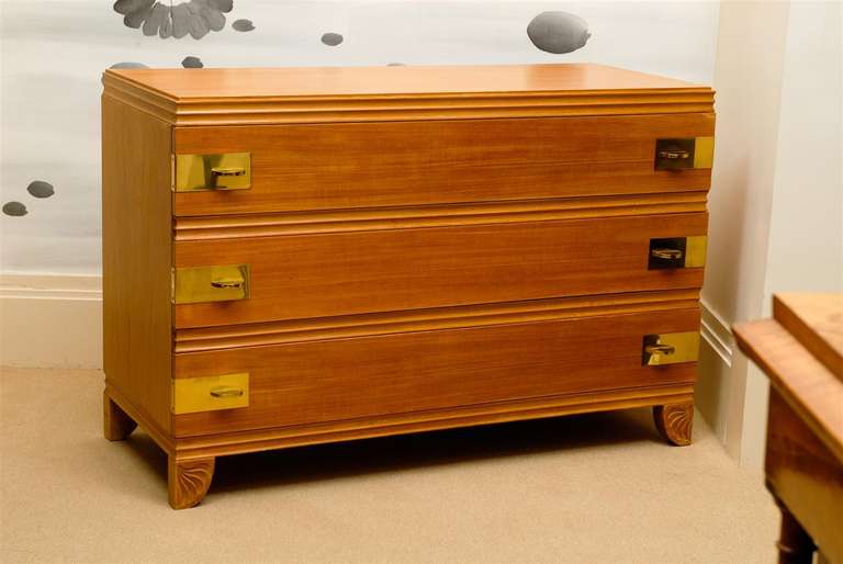 An elegant, rare three ( 3 ) drawer Modern chest by Widdicomb, circa 1938. Gorgeous case design with wonderful foot detail. Fabulous solid brass hardware highlight the piece.  Undoubtedly one of the most beautiful designs in the Widdicomb catalog. 