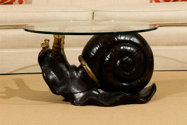 Fabulous bronze snail coffee table.