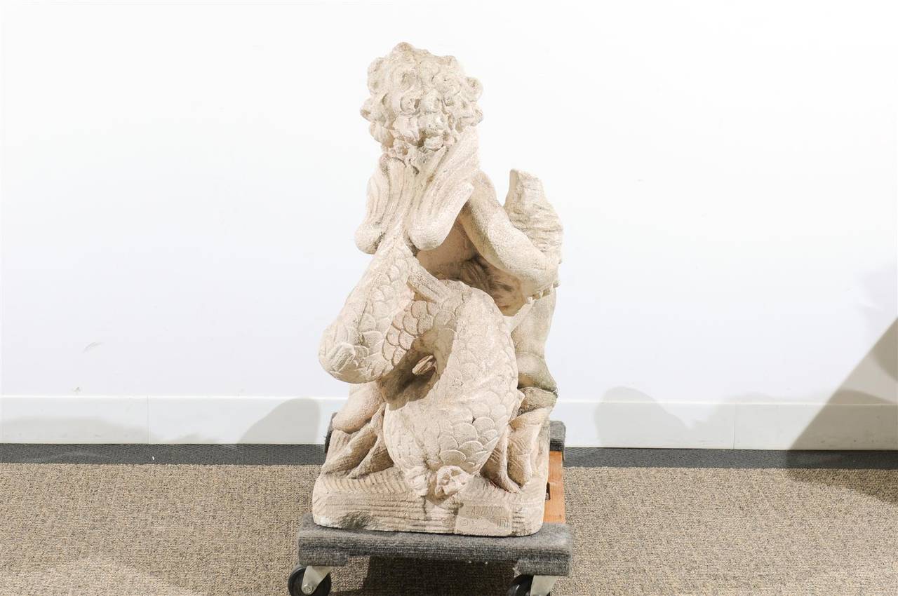 cherub with dolphin