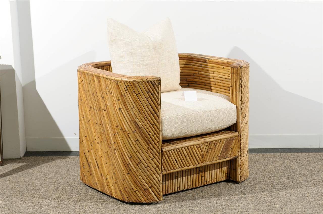 Spectacular Pair of Split Bamboo Chairs Diagonally Applied Veneer Over Hardwood Construction.  New Seat and back Pillows upholstered in a Linen Blend Texture.  Chairs are in Excellent Condition and Very Comfortable. Price Listed Is For The Pair.