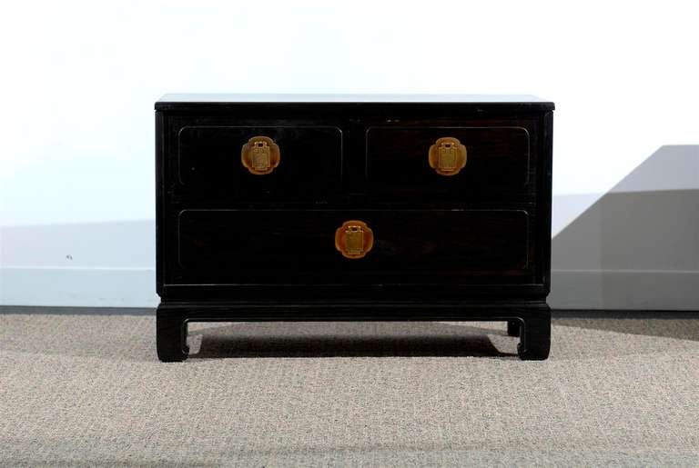 A beautiful pair of low chests in cerused oak, circa 1970's. Great size, may be used as end tables or night stands. Striking solid brass hardware. Retains the Maker label. Excellent Restored Condition. The price noted is for the pair.  For change of