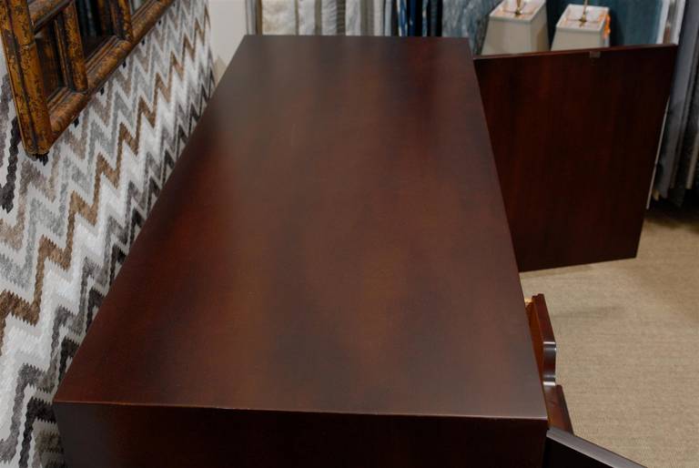 Sleek Restored Modern Buffet or Credenza in Walnut by T.H. Robsjohn-Gibbings In Excellent Condition For Sale In Atlanta, GA