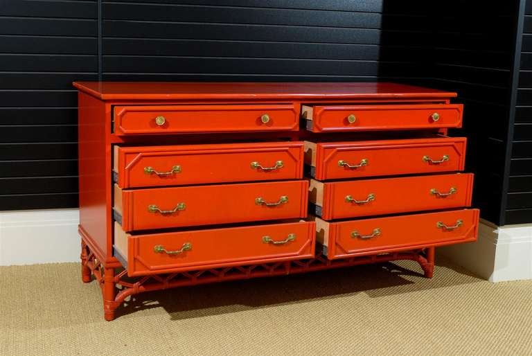 A stunning vintage Ficks Reed eight (8) drawer chest, circa 1970's. Hardwood case atop a lovely rattan base with beautiful detail. The size of the piece allows it to serve as a dresser, buffet or small credenza. Exquisite jewelry!  Excellent
