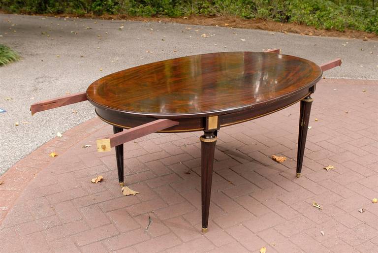 Unusual Flame Mahogany Dining Table Attributed to Maison Jansen In Excellent Condition For Sale In Atlanta, GA