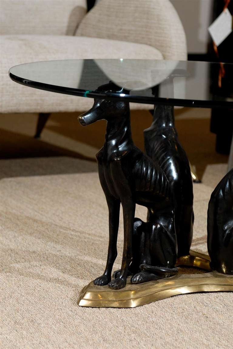 Great coffee table from Maitland-Smith, circa 1980. Cast bronze figures on a brass base with a glass top. Beautiful detail and FUN !!! Excellent Vintage Condition. Measurements are per glass. Base is suitable to hold a larger piece of glass.