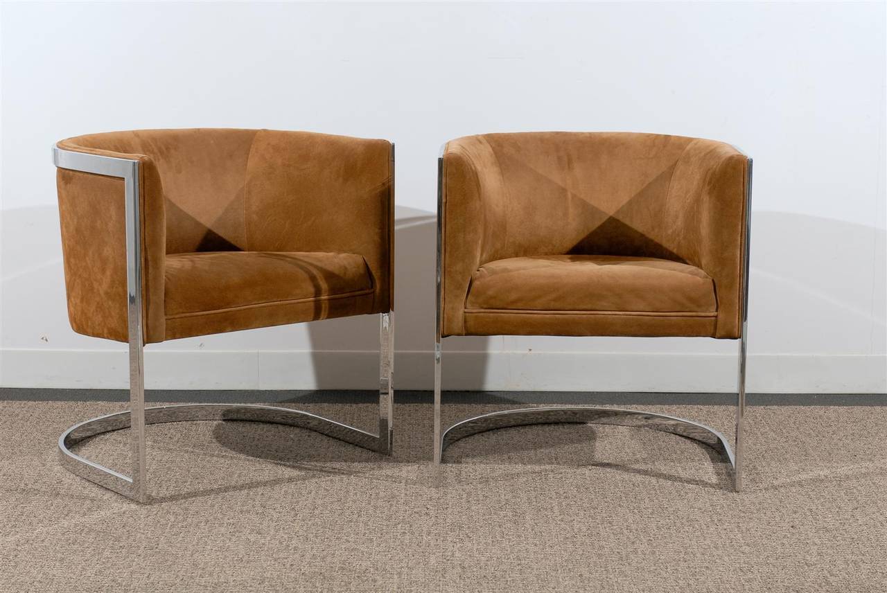 Pair of 1970s upholstered chrome and suede tub chairs.
