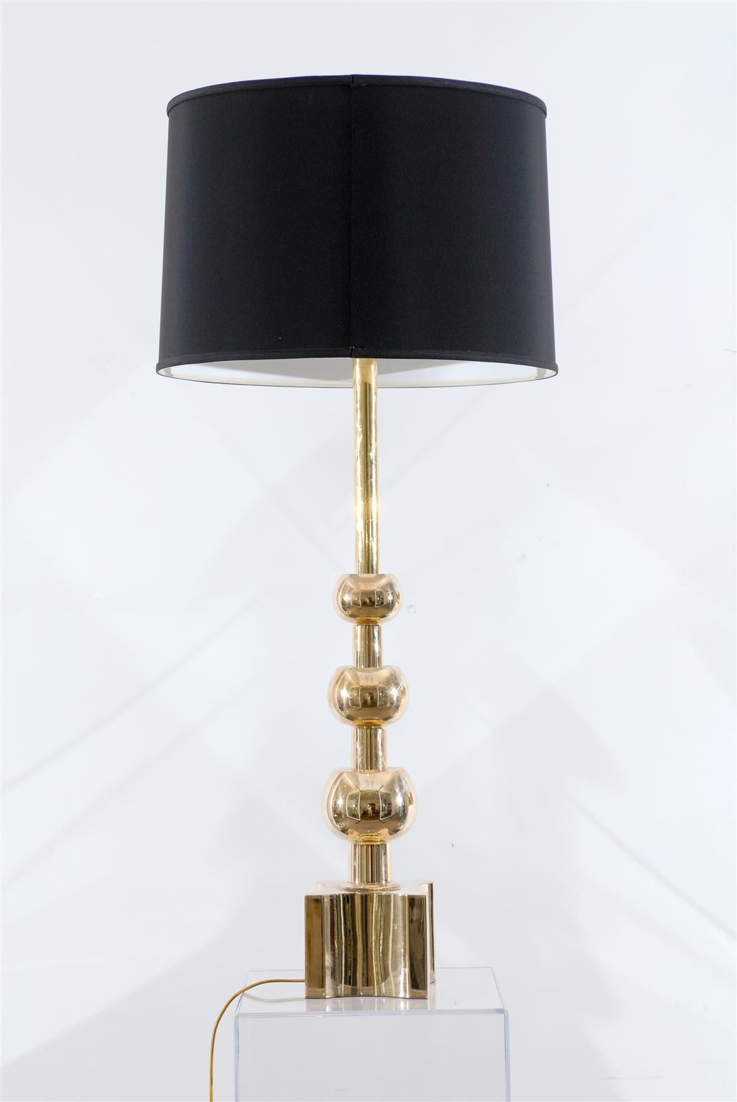 Beautiful pair of graduated brass ball pagoda lamps by Stiffel.
Restored and rewired with new gold silk cords. Height noted is to top of finial. The price listed is for the pair. Optional black or cream shades.