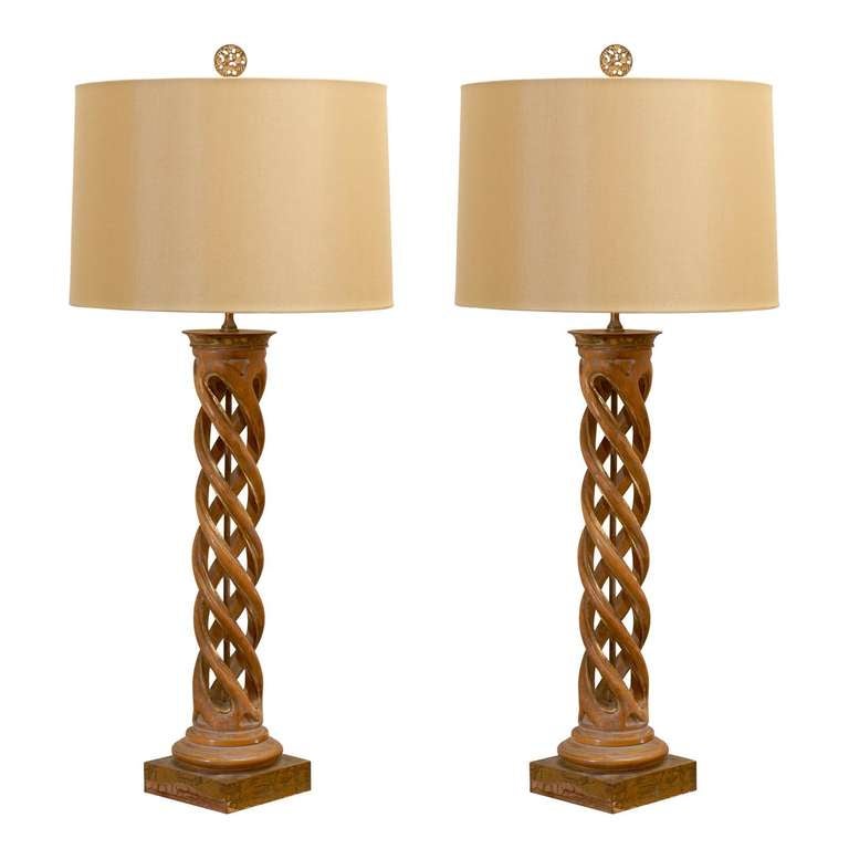 A Jaw-Dropping pair of Helix lamps by Frederick Cooper, circa 1950. Carved fruitwood with a subtle gold gilt detail. These pieces will add sophistication and design impact to any room. Excellent Restored Condition. Rewired, complete with silk cord