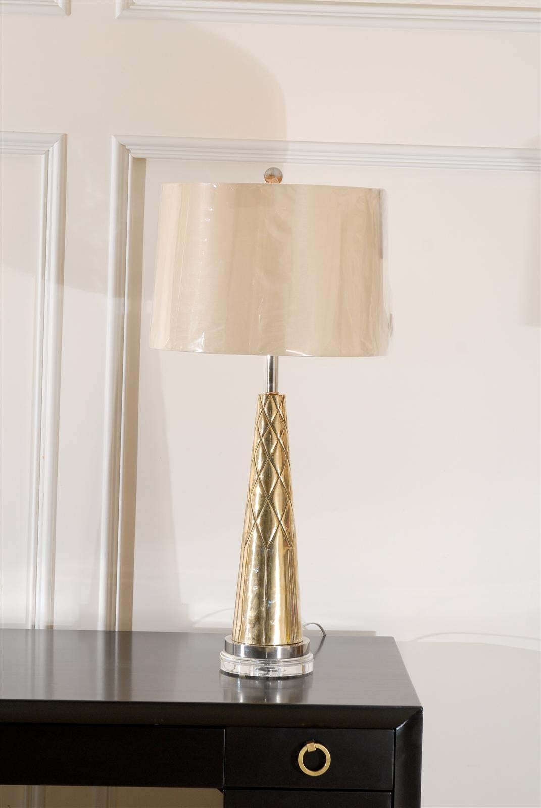 A fantastic pair of modern etched cone lamps, circa 1960. Comprised of nickel and brass-plated components, over solid bronze on a Lucite base. Heavy duty jewelry! Excellent restored condition, all components have been re-plated. Rewired with clear