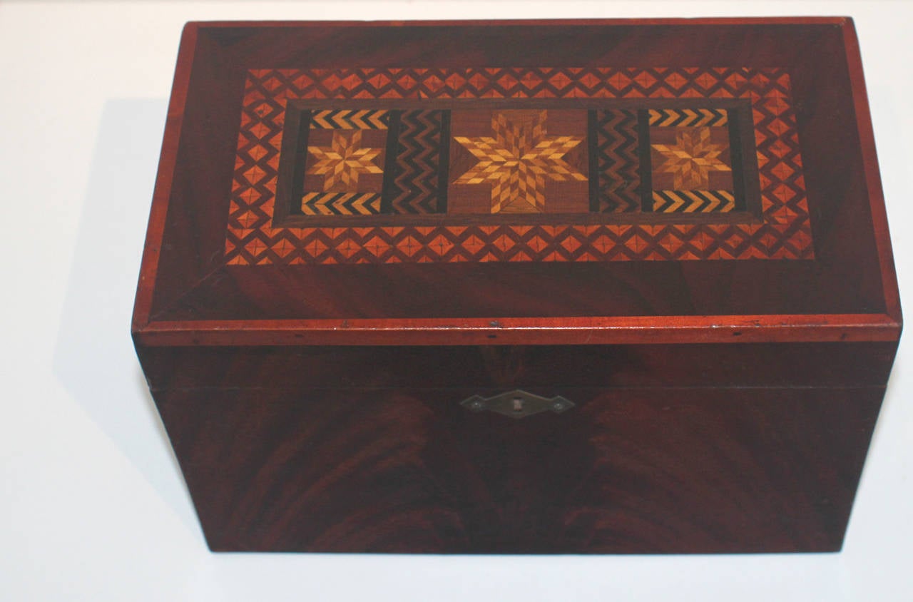 Handsome mixed wood inlaid box with rich grain, original hardware, lock and key. American, circa 1870. Good proportion and original finish.