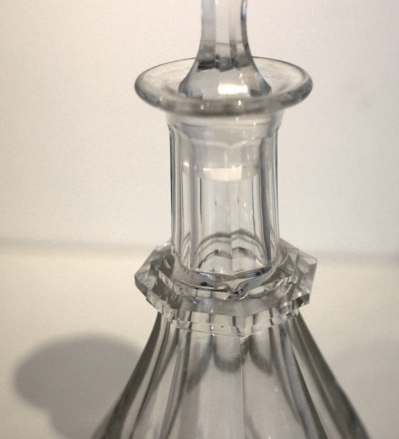 Fine cut glass decanter with an unusually tall original stopper, also with cut decoration. Probably American, 19th century. Excellent condition.