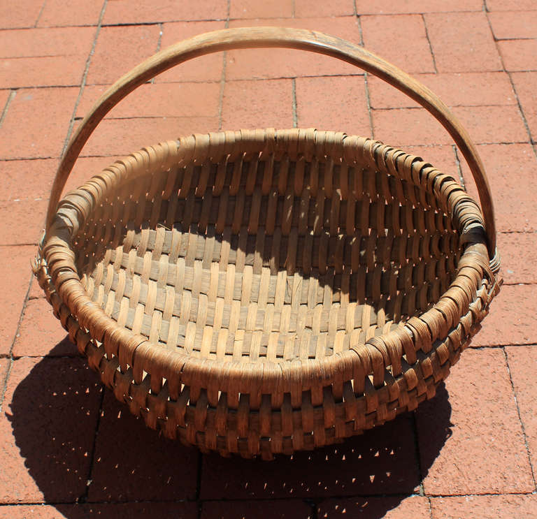 Large woven melon basket, nice form, sturdy handle; American, circa 1880