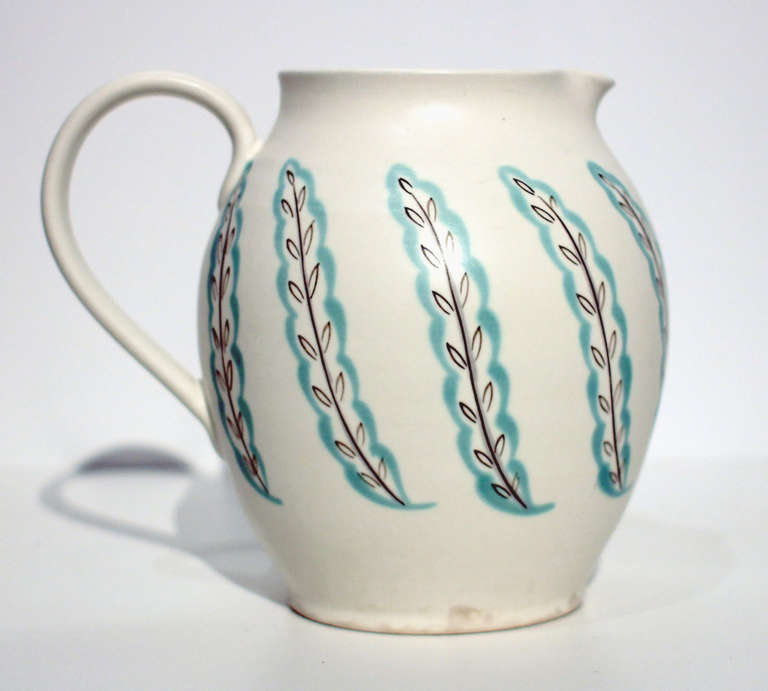 1950s freeform Poole pottery in modernist painted designs.

Starting out as a tile manufacturer in the 19th century, the Poole company developed outstanding glazing techniques and interesting forms. In the 1950s, after the wartime restrictions