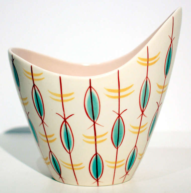 1950s Freeform Poole Pottery in modernist painted designs.

Starting out as a tile manufacturer in the 19th century, the Poole company developed outstanding glazing techniques and interesting forms. In the 1950s, after the wartime restrictions