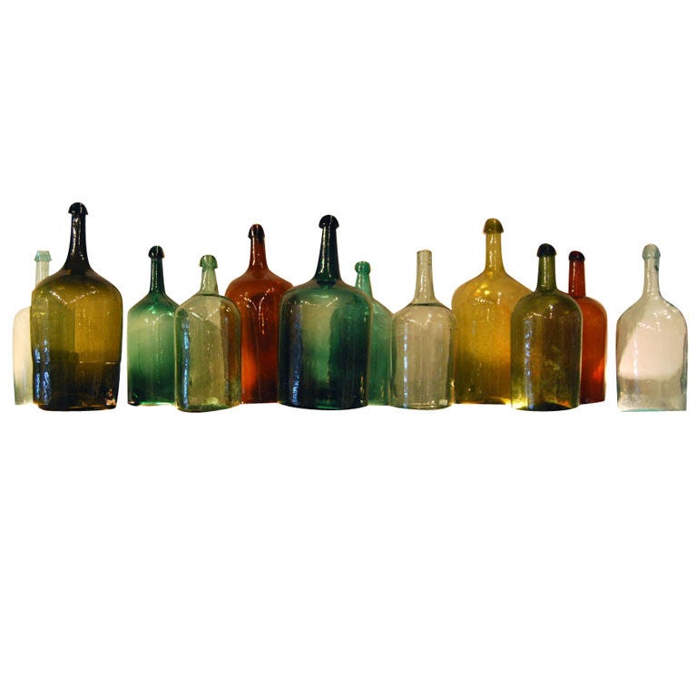Collection of 14 Large American Glass Demijohn Bottles