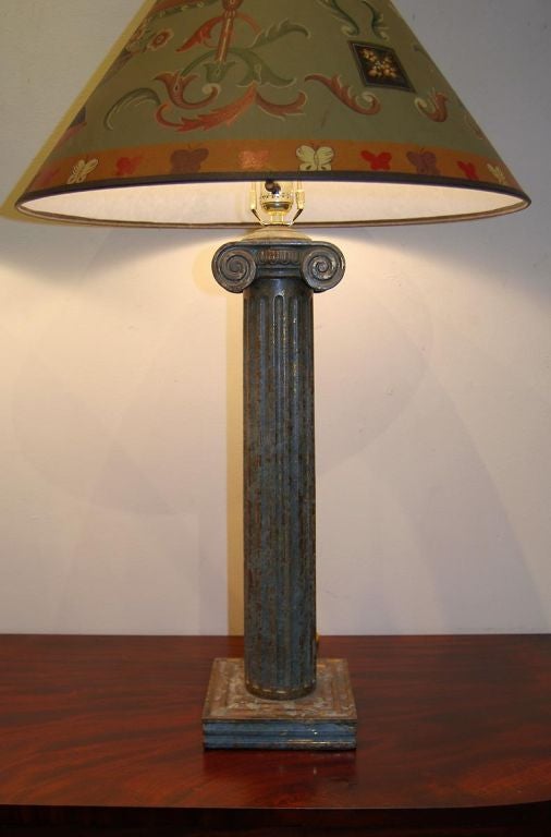 Pair of lamps in the shape of ionic columns, white metal with a nice, old patina. New wiring for 3-way lighting and contemporary hand-painted shades and finials