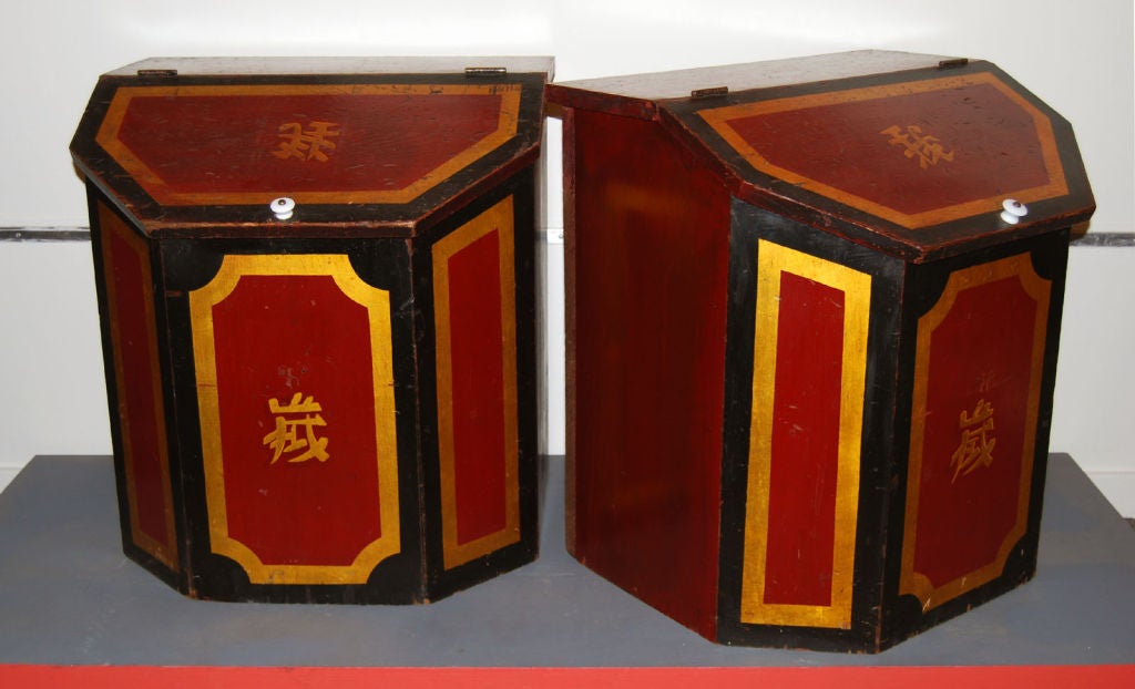 Pair of large Chinese storage bins for tea, in original striking red, black and gold paint; each with two silver paper-lined compartments. These would have been made for a shop and were used in New England. Priced for the pair.