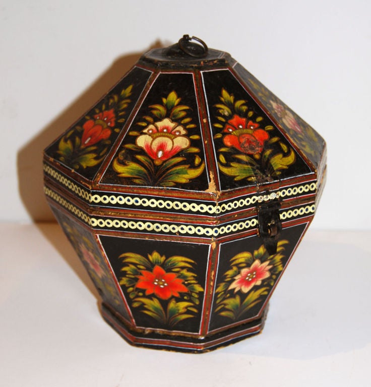 Rare octagonal hinged box, original paint over pressed board, Norwegian Rosemaling design with a burnt orange color painted inside and on the bottom, circa 1870. All original.