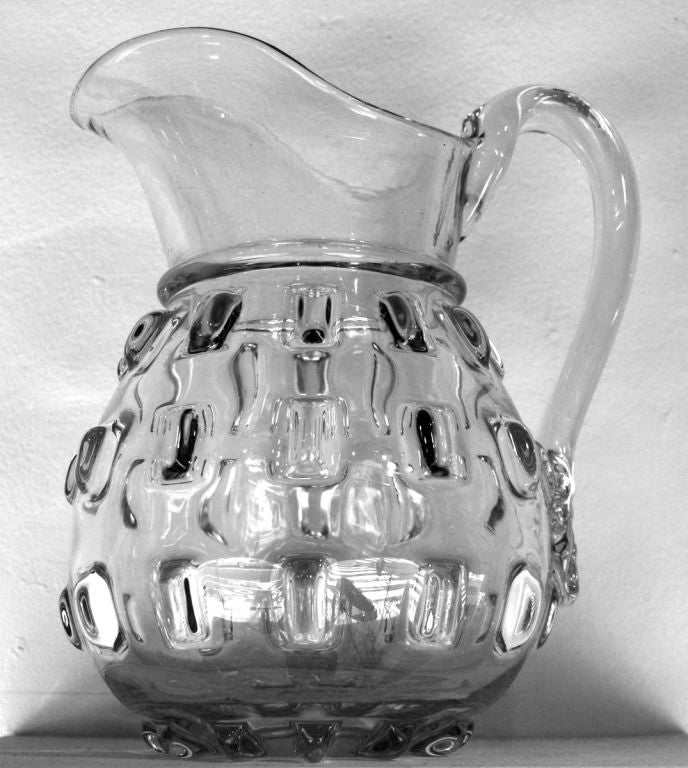 Handsome hand-blown glass pitcher in the cleat pattern, with applied handle; Pittsburgh, circa 1850. Heavy weight, mint condition.