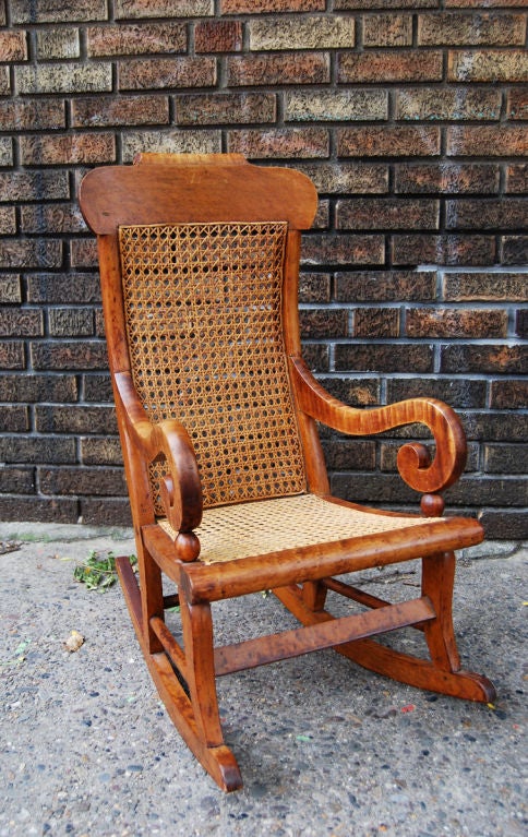 Late Classical Child's Rocker, figured maple, graceful lines, re-caned, probably American. Excellent patina, very sturdy.