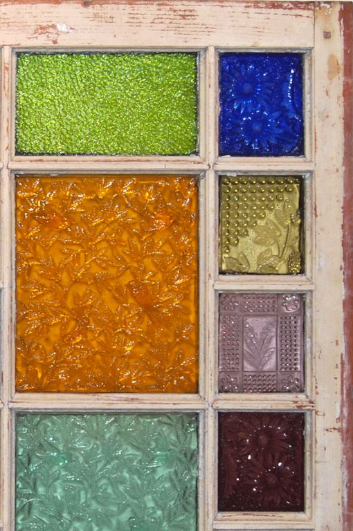 The Mosaic Glass Company began in Ohio then moved to New York. These tiles made the Company notable. Jonathan Haley, of Fostoria, Ohio made the molds, which were later taken to the new plant in Addison, New York. The tiles were used as decorative 