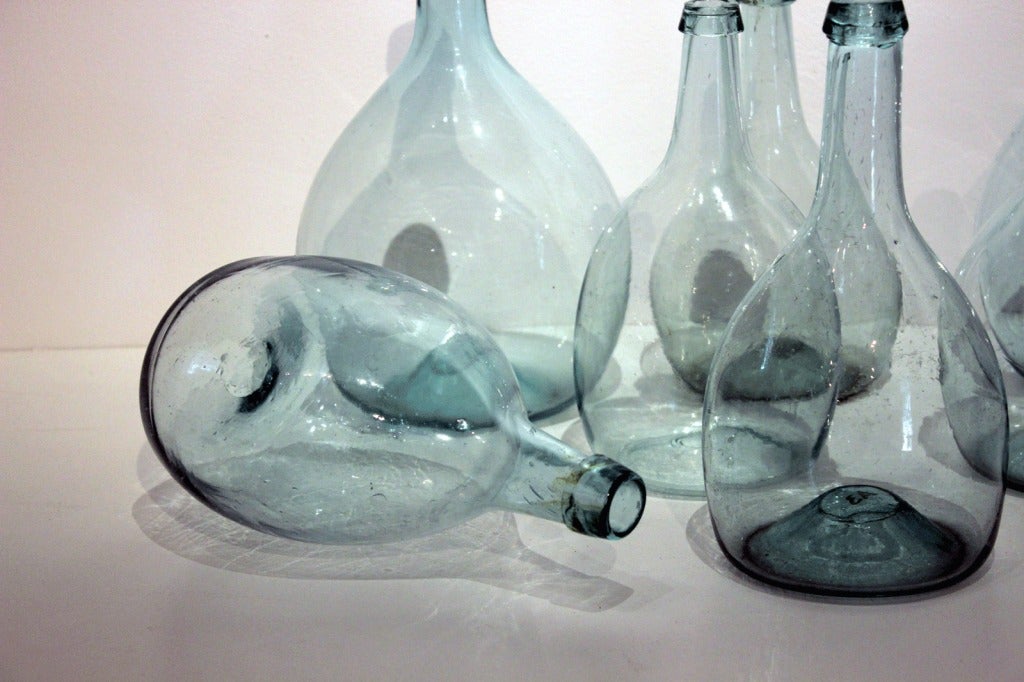 American Collection of 7 Aquamarine Blown Glass Bottles