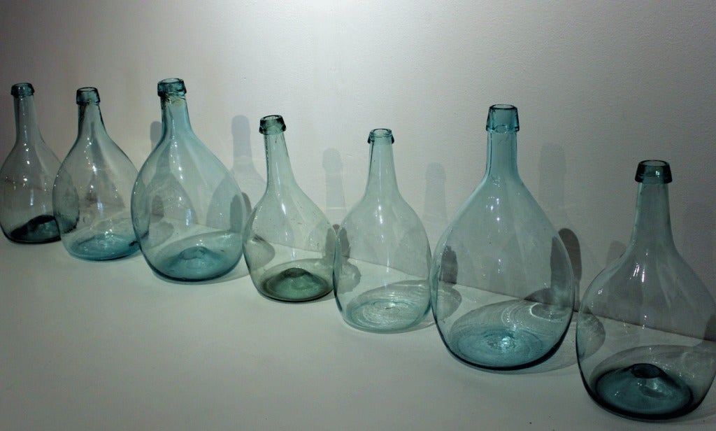 Collection of 7 Aquamarine Blown Glass Bottles 1