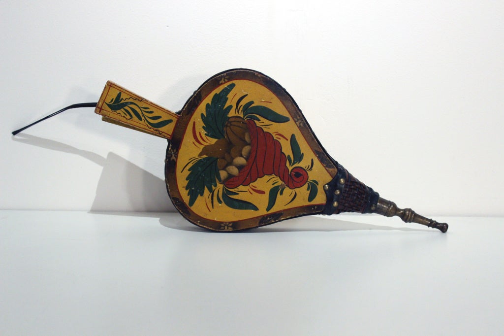 American folk painted bellows with original paint decoration, depicting a still life composition of a cornucopia with fruit, painted in stencil and free-hand paint with excellent border design ; leather and mechanics have been restored and its now