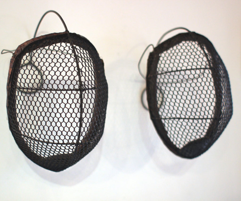 American Pair of Early 20th Century Fencing Masks