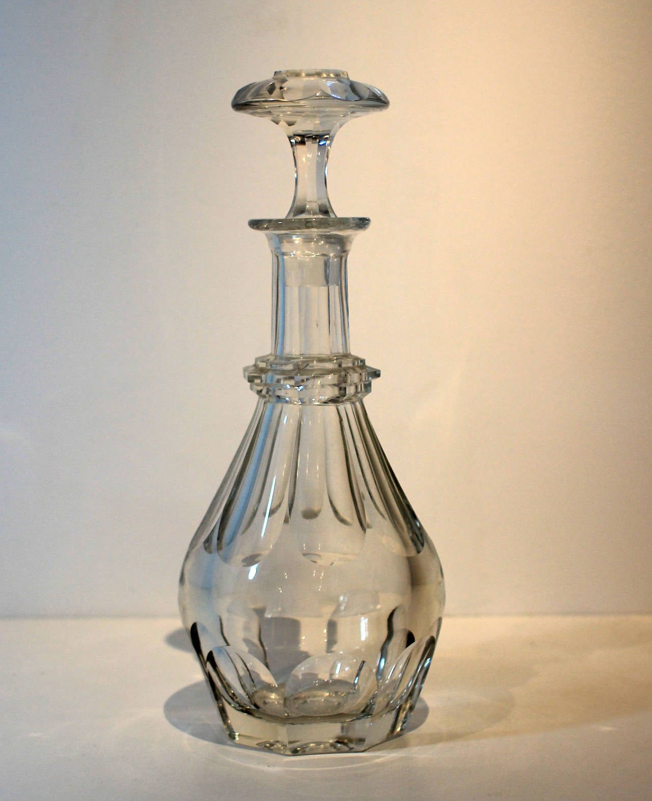 Tall, statuesque decanter with unusually tall stopper and fine cut decoration. Probably American, 19th century.