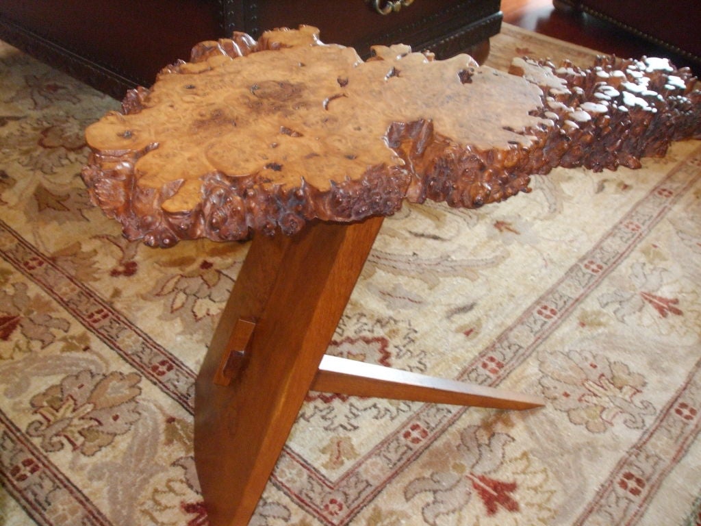 A wonderful and rare Burled end table or drink stand.<br />
This is one of the most interesting burled tables that I have seen to date. Vey well balanced with it's thick top being supported by a very delicate base