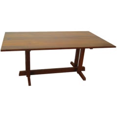 A Walnut Frenchman's Cove Dining Table by George Nakashima