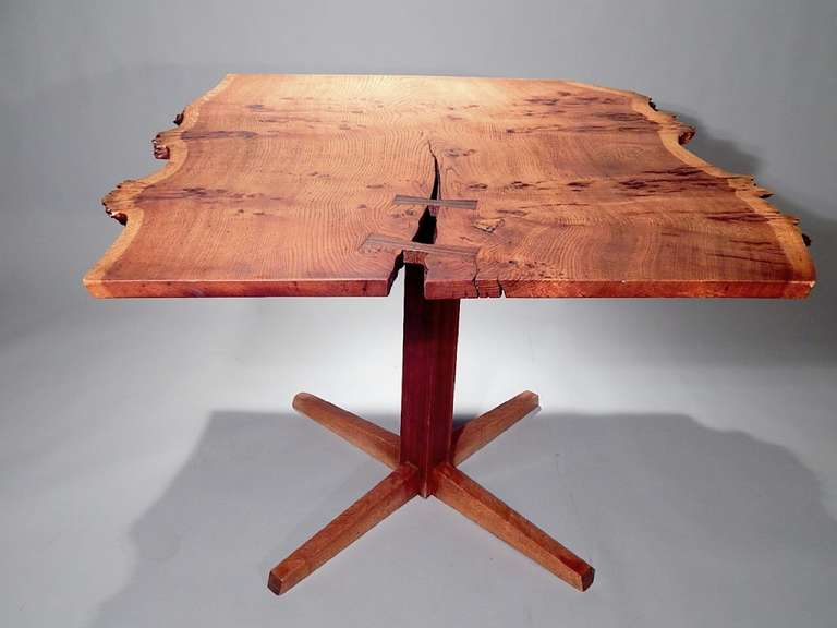 A very rare and interesting example of the Cafe /Game table.
The top having great burl details with Rosewood butterflies as well. Supported by single pedestal base.