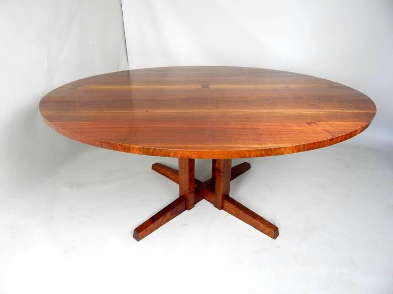 Solid Highly figured Walnut top having Rosewood Butterfly joinery. Solid Walnut base.  This size top being 65