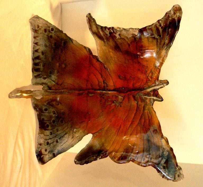Amanda Brisbane (British 1964-  ) is internationally recognized as a singularly talented sand casted glass artist within her own medium, techniques, and the remarkable, stunning pieces she creates. “Inspired by glass and the challenges it creates;