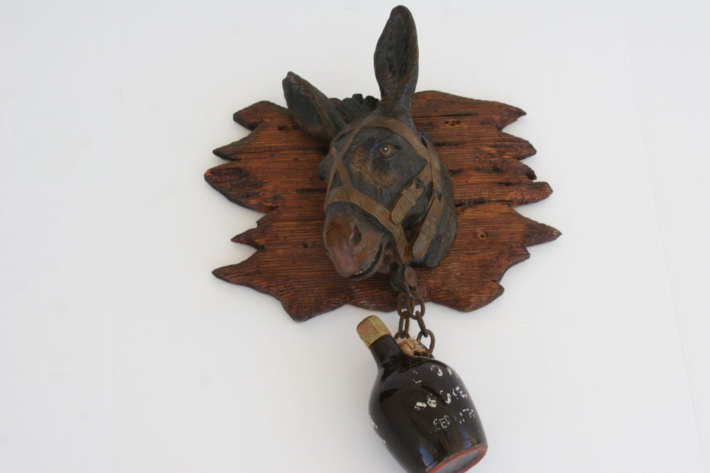 Fold Ard Advertisement Sign. A whimsical composition of a mule's head and 