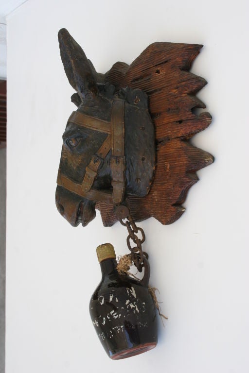 Plaster Mule's Head and Moon-Shine Bottle