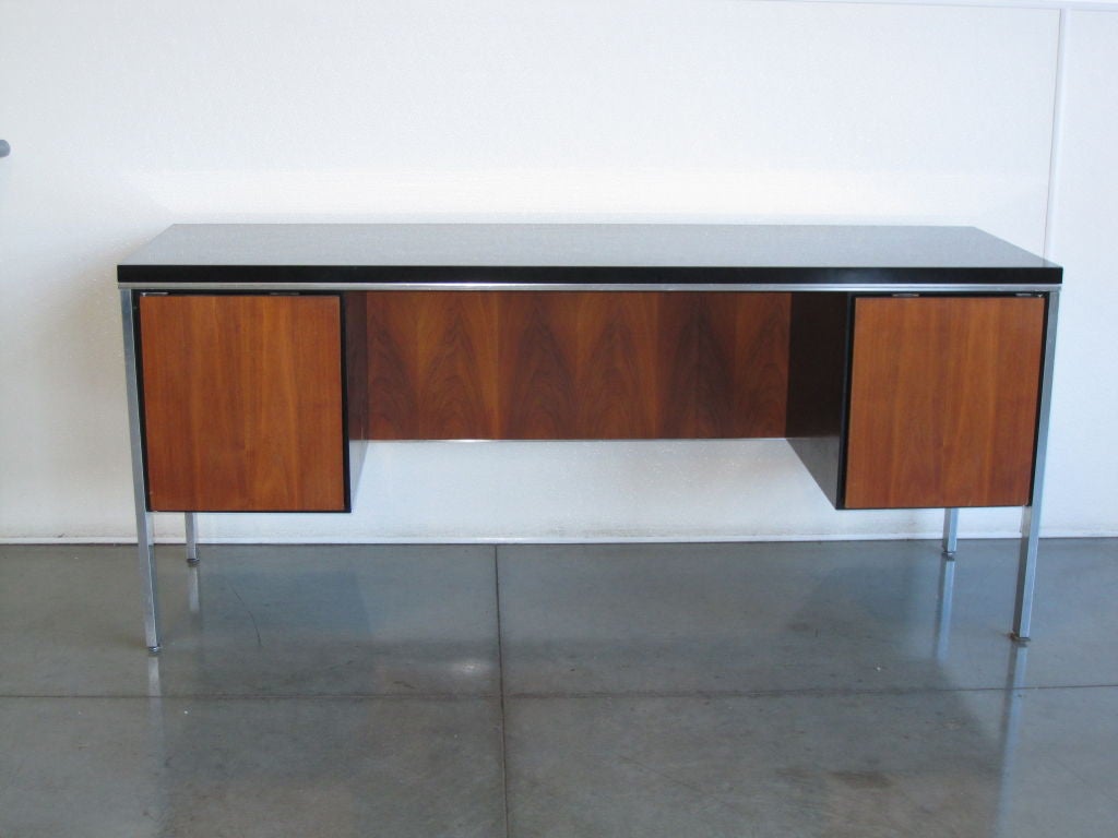 Spectacular Mid-Century Modern desk, a great combination of rosewood, aluminum and black laminated top.