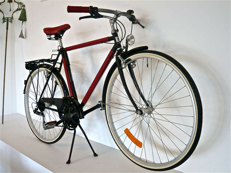 A superb and extremely rare bicycle by Hermes of Paris. These bicycles were made in very limited numbers. The original bicycle by Peugeot has been taken by Hermes and has been given a matte black paint scheme and wrapped in traditional tan leather.