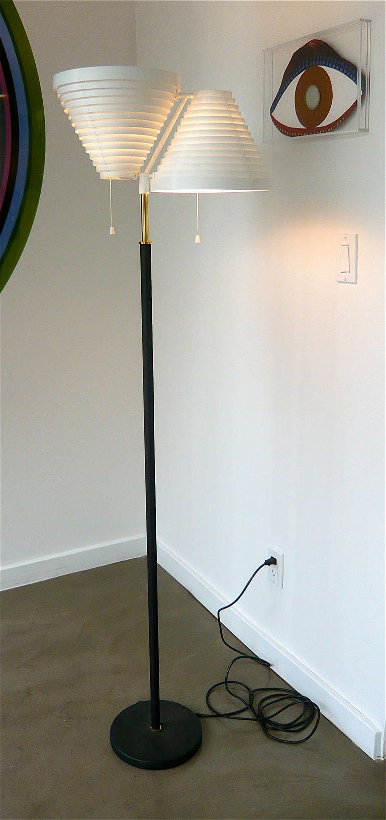 Designed by Aalto in 1955 for Artek,Finland.Hand riveted steel shade on leather wrapped black steel base with brass accent and pull cords.