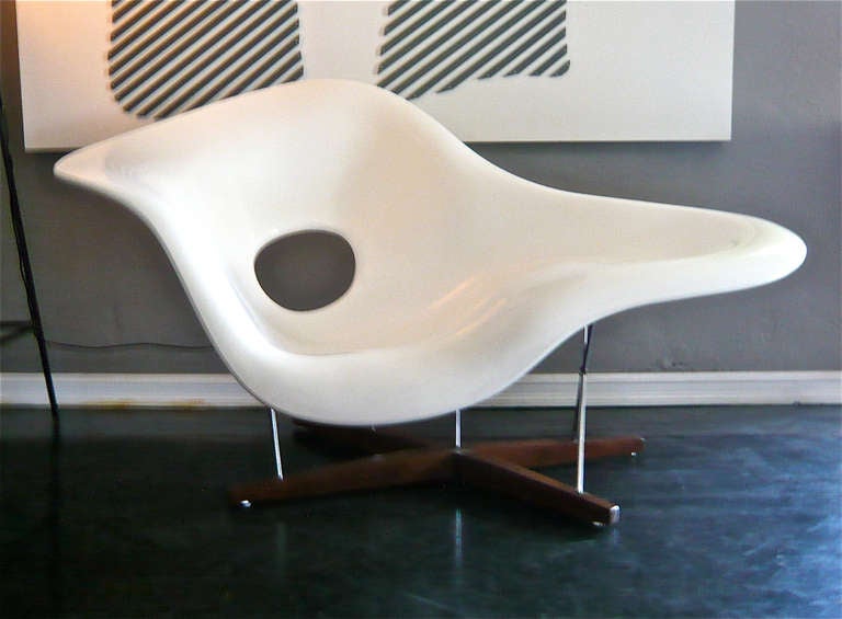 The prize winning La Chaise, created in 1948 for a competition at the New York Museum of Modern Art, is an icon of organic design providing an artistic centerpiece for any interior.