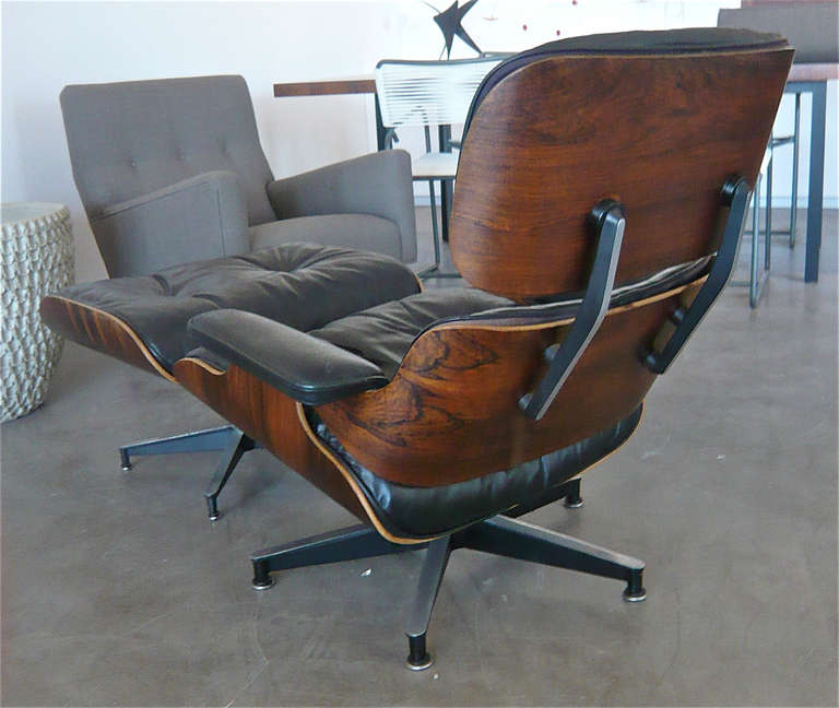 Mid-20th Century Charles Eames Rosewood Lounge Chair + Ottoman