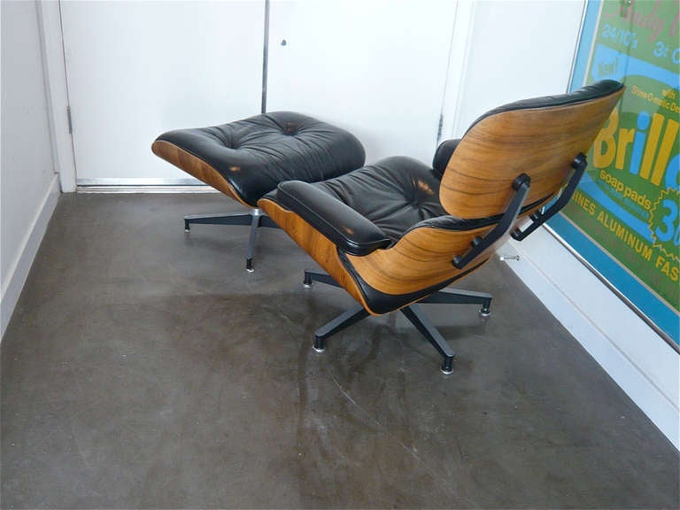 Iconic rosewood / black leather Charles Eames 670 /671 lounge+ottoman designed for Herman Miller.Beautifully grained rosewood,original leather in great condition.Retains labels.