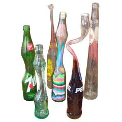 A Collection of Sixties Stretched Soda Pop Bottles