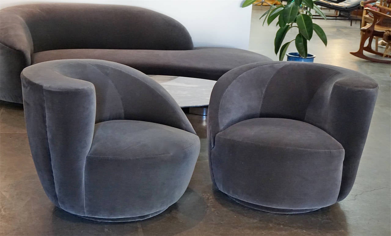Designed by Kagan for the Directional Furniture Co. Reupholstered in dark gray, high quality cotton velvet and mounted on swivel bases.