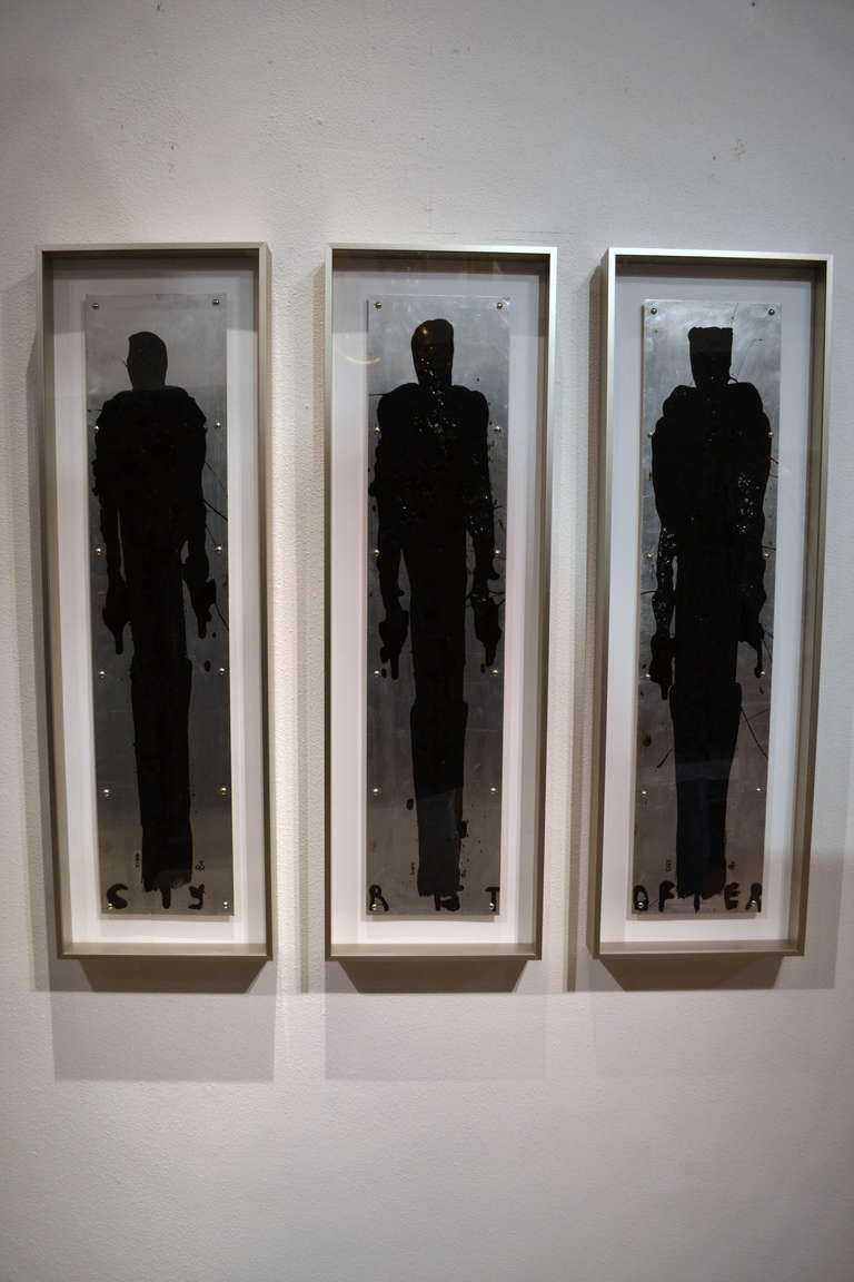 Self-taught artist Christopher Shoemaker (b. 1969), who for years has produced some rather amazing works of art, didn't stop here.  This triple framed figurative  in black is striking, handsome and unique.  Inside a silver finished shadow box like