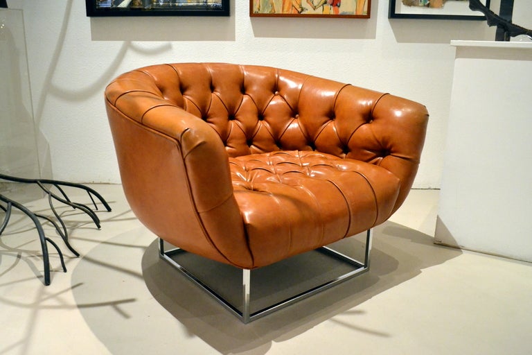 This chair was the prize procession and choice piece of period furniture belonging to California's most popular and iconic television host, Huell Howser.  

A plush and richly tufted leather chair together with its stainless steel footed